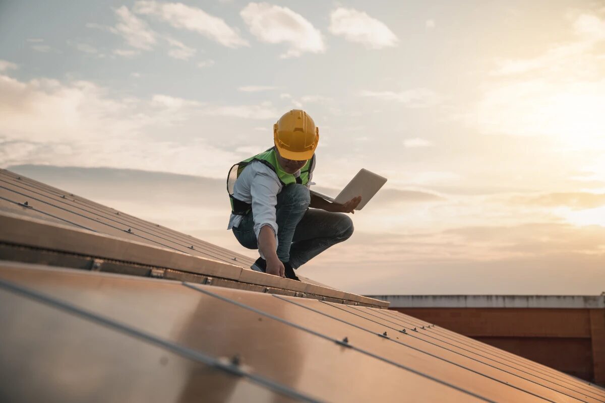 Roof professional inspecting a roof