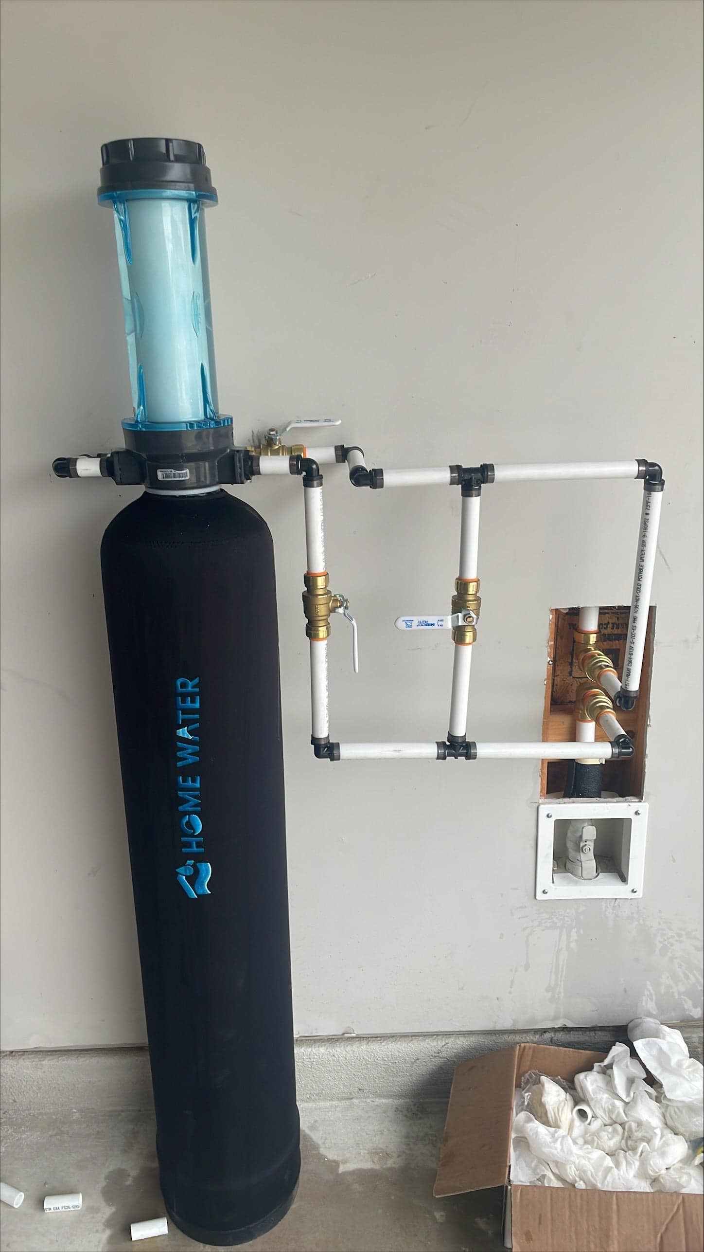 HomeWater whole-home filtration system installed and connected inside a home